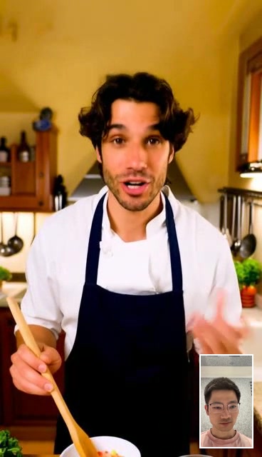 An Italian chef talking and gesturing during a live video conversation